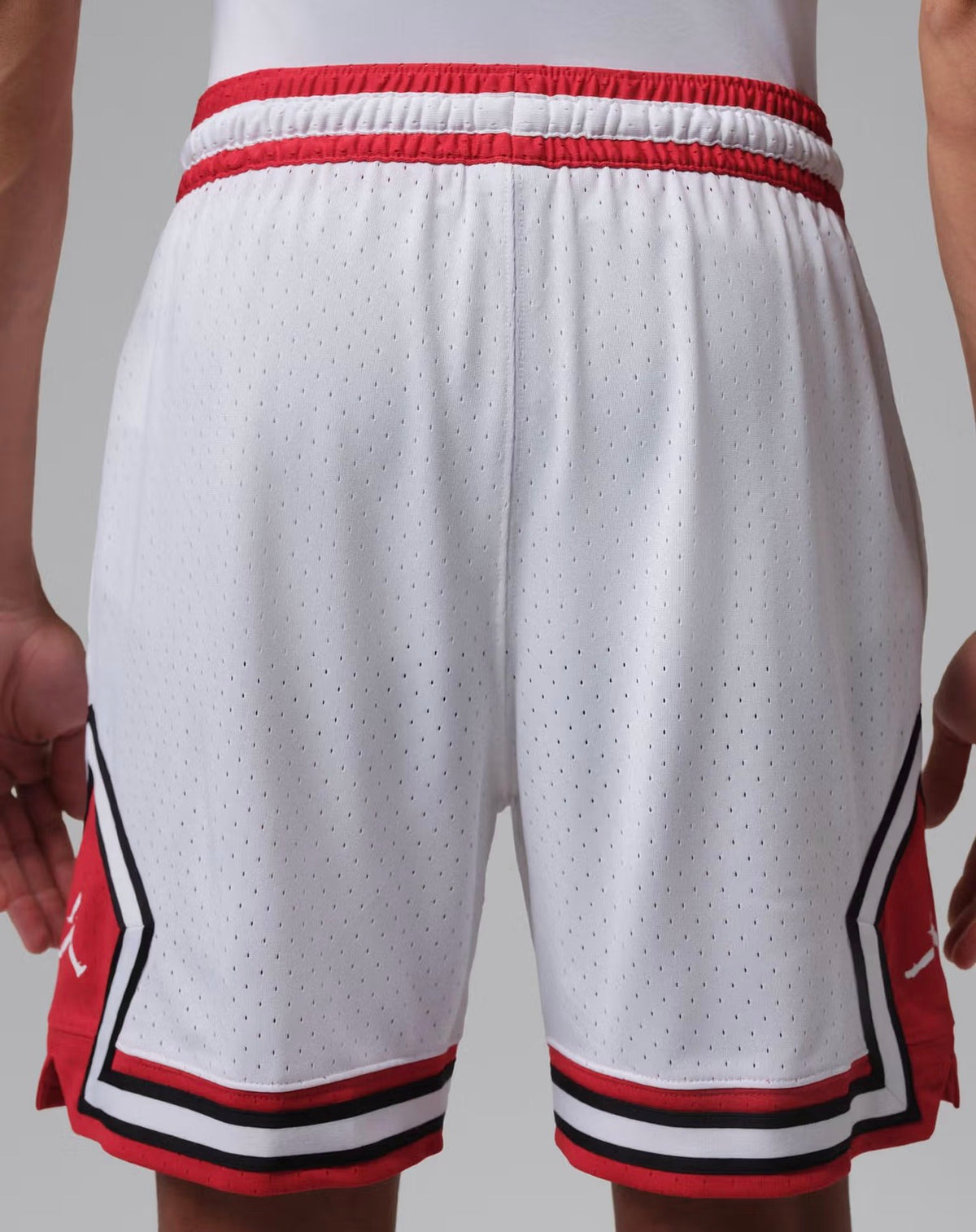 Jordan Sport Men's Dri-FIT Mesh Diamond Shorts in the White/Gym Red colorway