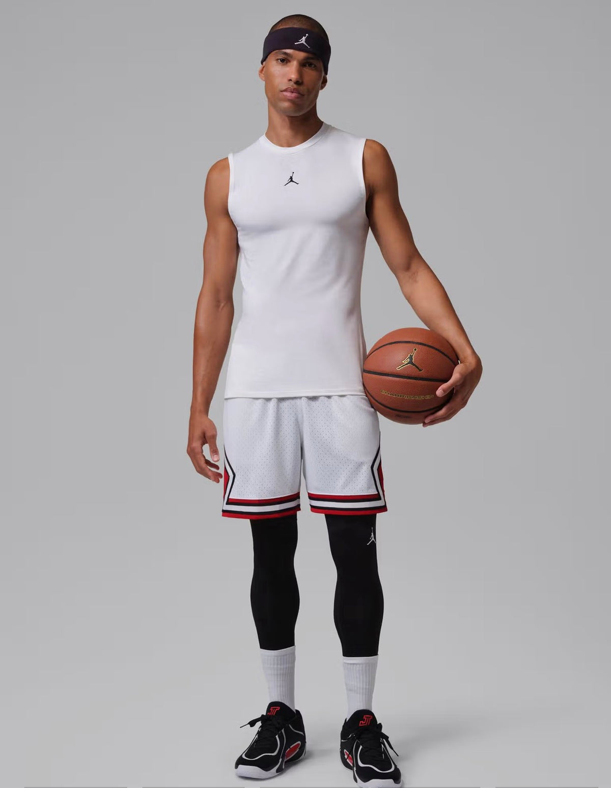 Jordan Sport Men's Dri-FIT Mesh Diamond Shorts in the White/Gym Red colorway